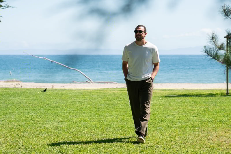 Hands-On: lululemon Daydrift Trousers Review 41 Model in park wearing the Men s Daydrift Relaxed Pleated Trouser