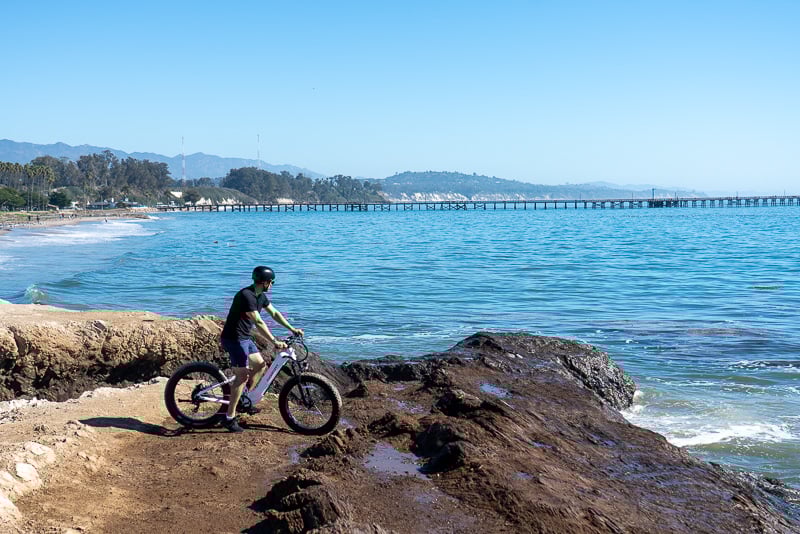 Model riding ocean trail with Puckipuppy Boxer ST