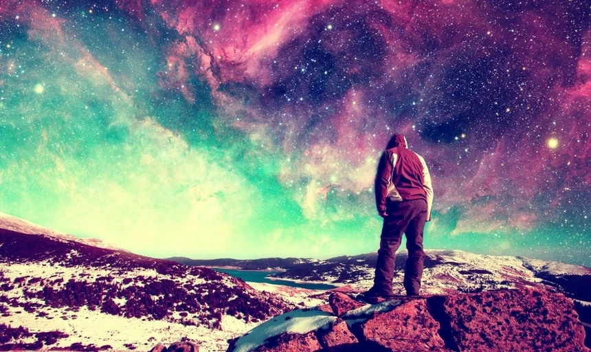 30 Things Every Man Should Do Before Turning Thirty 53 Dreamer standing on the rocks looking at the sky and thinking about his purpose in life