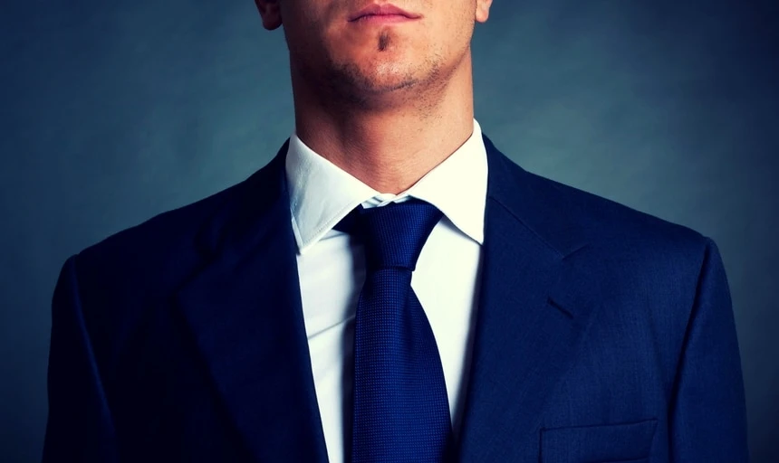 38 Lessons: The Ultimate Guide to Men's Fashion From a Female Perspective 138 Man closeup with navy tie and navy suit with white shirt