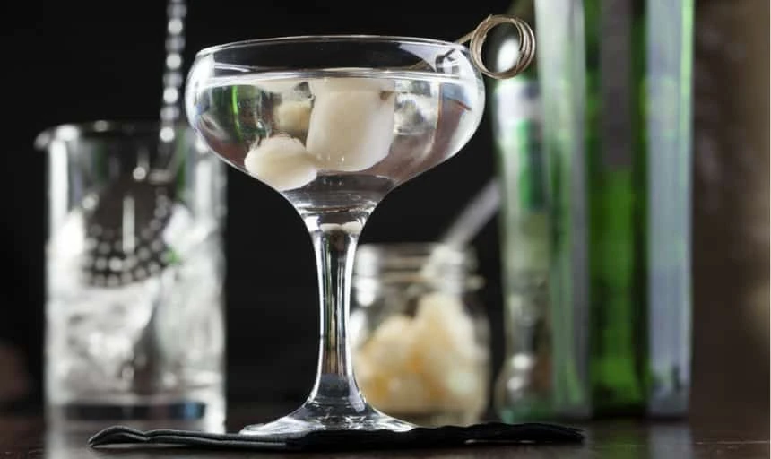 gibson cocktail with bar in background