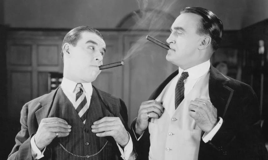 Two business men smoking cigars vintage black and white style