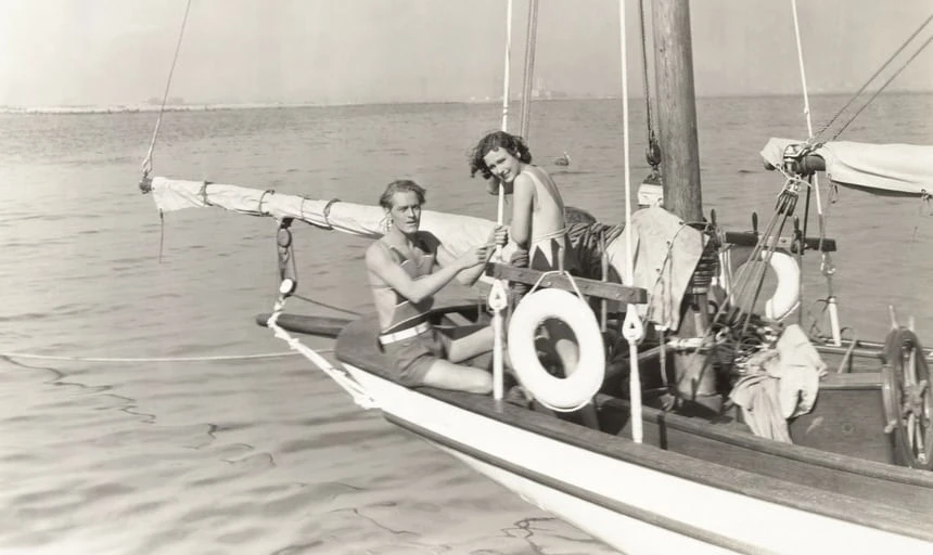 Vintage shot of a man and woman sailing