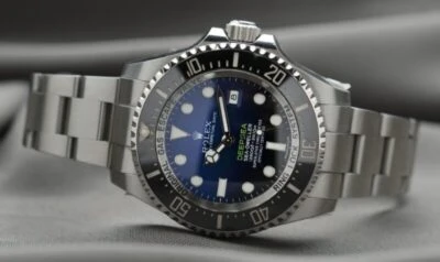 2019/03/Best-Online-Watch-Stores_-Picture-of-a-Rolex-Lying-On-Its-Side-With-A-Gray-Background-e1591732783417.jpgw3.webp