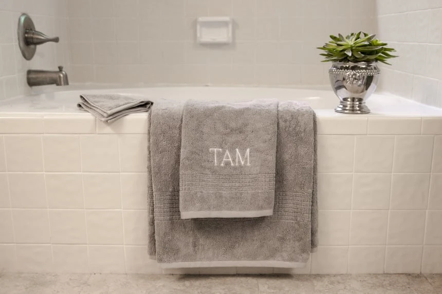 Luxor Linens Review (+ How to Keep Your Sheets Tight With the Bed Scrunchie) 63 Luxor Linens Valentino Luxe Egyptian Cotton Spa Towels hanging on bath