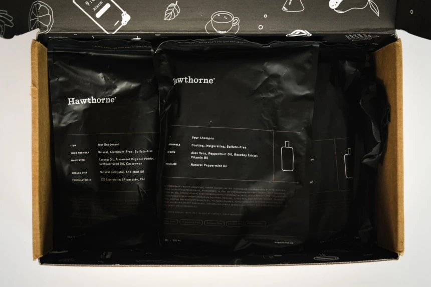 Hawthorne Box Open Top Down Showing Shampoo and Body Wash Packaging