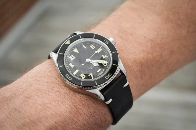 closeup wrist shot of model wearing watch