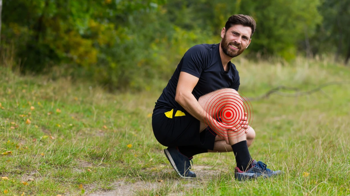 How To Recover From A Workout 5 Easy Tips to Relieve Soreness Man onn Trail with Sore Calf Muscle