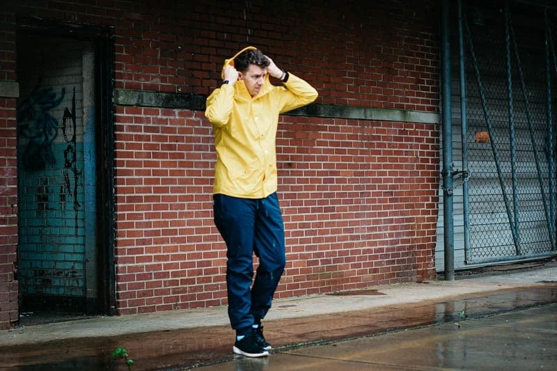 Rains yellow jacket and rains trousers during rainy day
