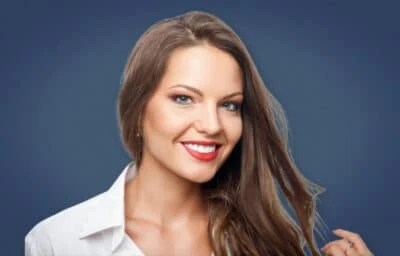How to Tell if a Girl Likes You: 13 Surefire Signs 30 How to tell if a girl likes you Attractive woman playing with her hair and smiling straight down the camera