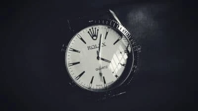 2021/01/Watches-That-Look-Like-Rolexes_-Rolex-Quartz-Watch-on-Wrist-Black-Background.jpgw3.webp