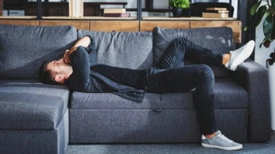 2021/01/Why-Is-Life-So-Hard_-Stylish-Man-Having-a-Bad-Day-Lying-on-Sofa-.jpgw3.webp