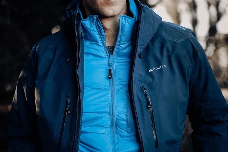 Cortazu Review: Don’t Get Stuck on the Mountain 54 Cortazu hard shell jacket in contrast with mid layer zip in jacket