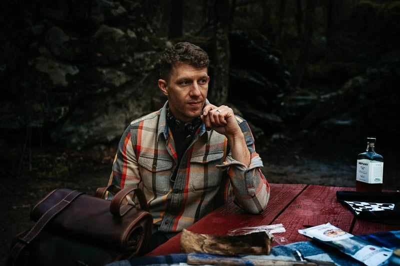 Cigars 101: What Every Guy Must Know Before Lighting Up 32 model holding La Aurora cigar