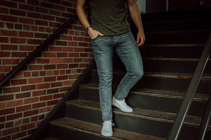 model wearing KOIO sneakers