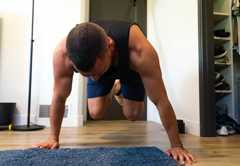 Model doing abs on TRX