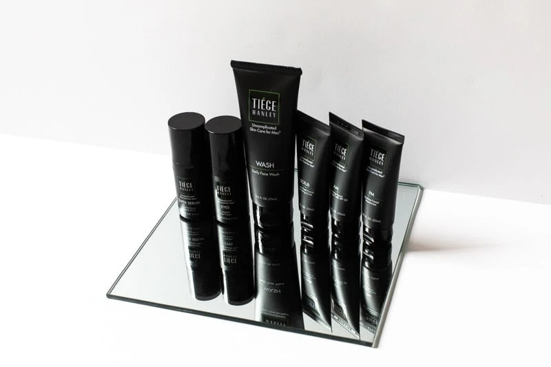 How to Care for Oily Skin: A Man’s Guide for 2024 58 Tiege Hanley on mirror for title shot from side