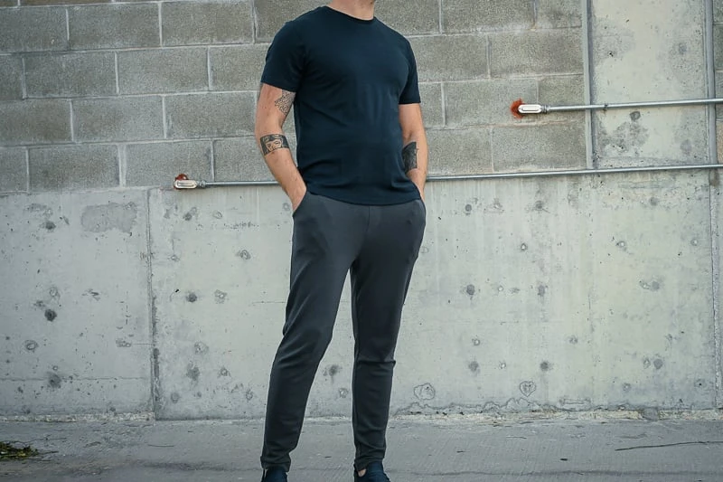Unbound Merino Turns Luxe Wool into Utilitarian Might 48 Man wearing blue Unbound Merino Tee and Sweatpants