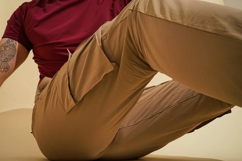 Alo Yoga Review: How Does This Activewear Brand Stand Out from the Rest? 44 Man wearing Alo Yoga field pants