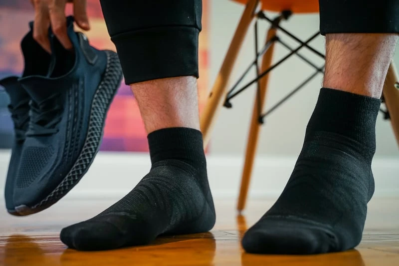 Man with Darn Tough Running Socks and running shoes