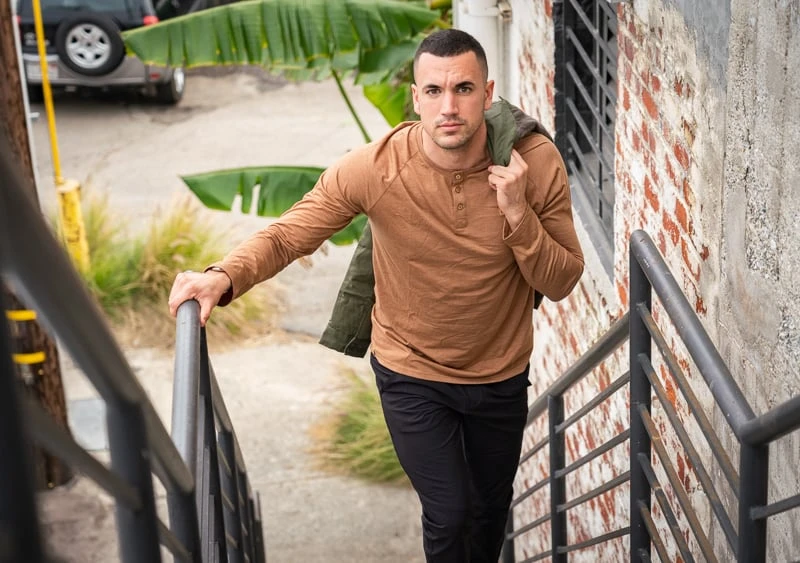 tentree Review: I Tried Their Most Popular Styles 41 Model on staircase in tentree