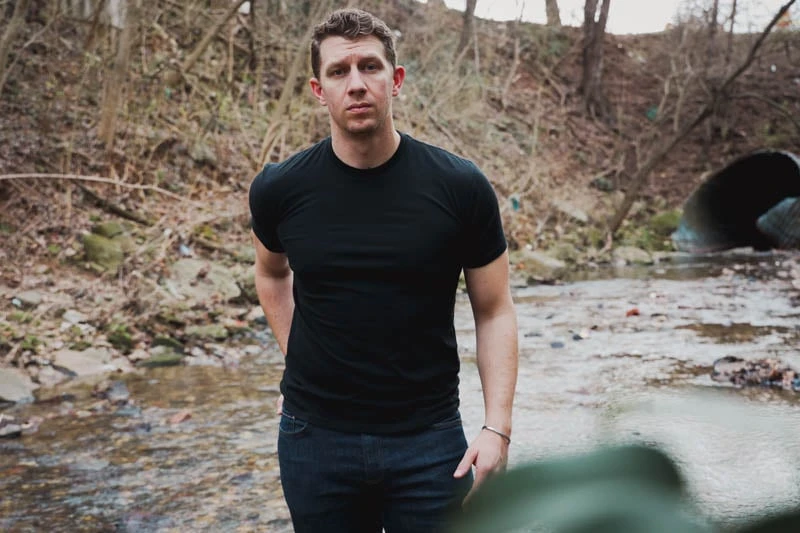 True Classic Tees model wearing black t shirt