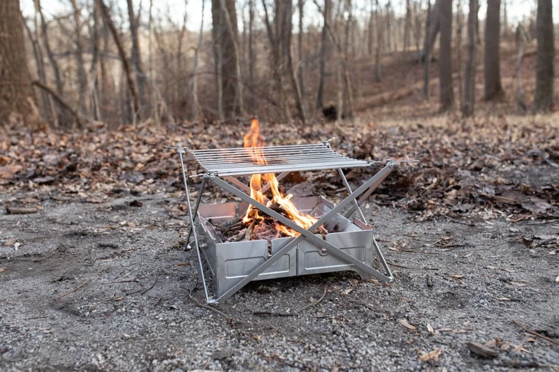 5 Best Camping Grills: Seared, Sizzled, and Reviewed 32 Wolf and Grizzly Campfire Trio from the side 1