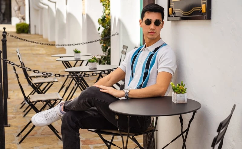 Model sitting in Button Through Mod Polo