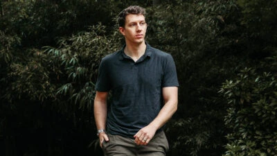 Best Polo Shirts for Men Male Model Wearing Vuori Strato Tech Polo
