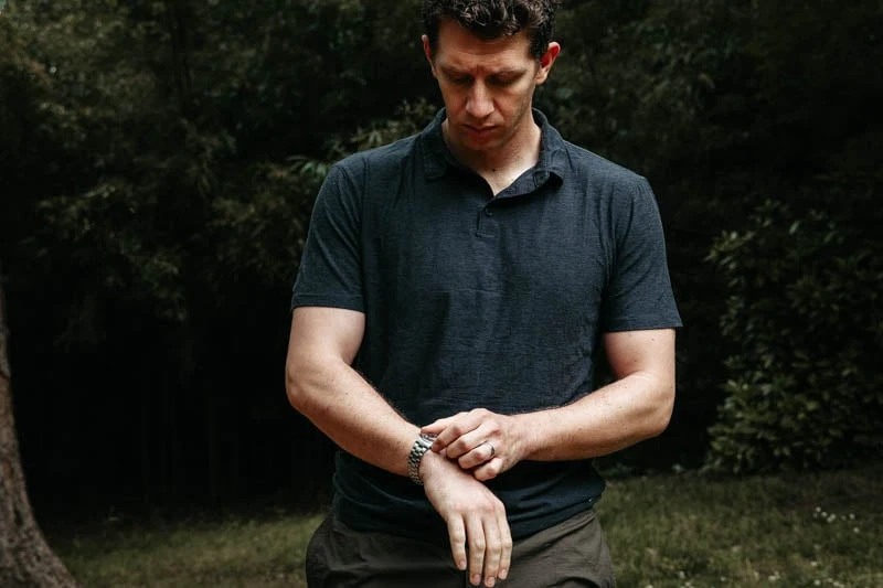 Vuori charcoal polo strato tech fabric