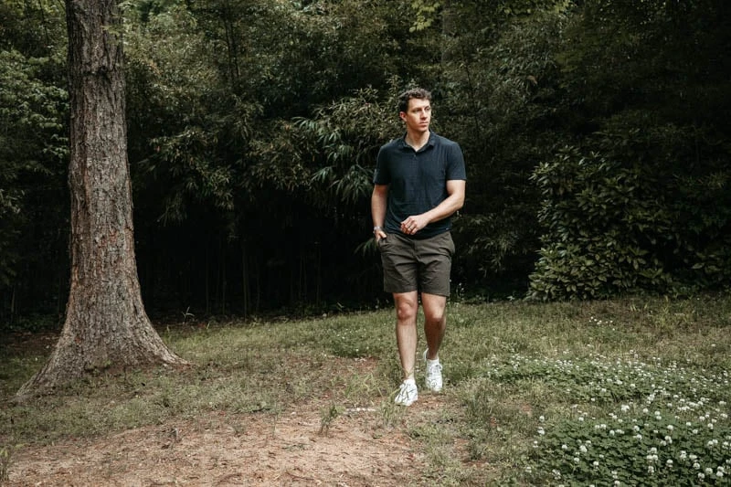 model wearing Vuori strato tech polo