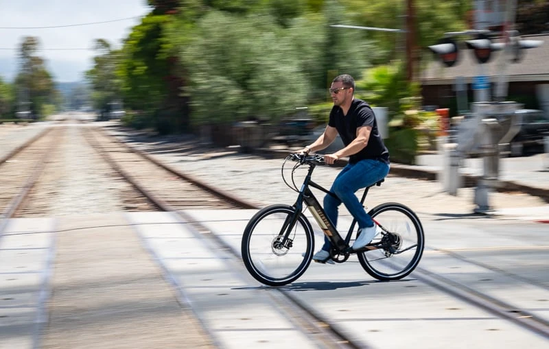 Model riding black Aventon Pace 500 Next Gen
