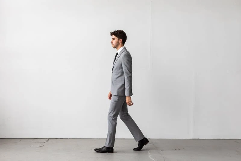 Bluffworks Presidio Blazer and Pants model walking to the side