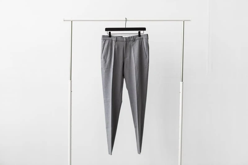 Bluffworks Presidio Pants on hanger on white background