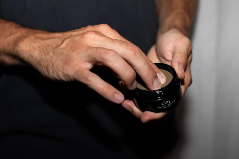 Jack Henry Clay being scooped out of jar