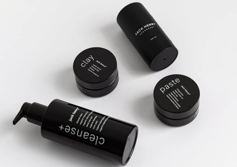 Jack Henry self care products unboxed on white background from side