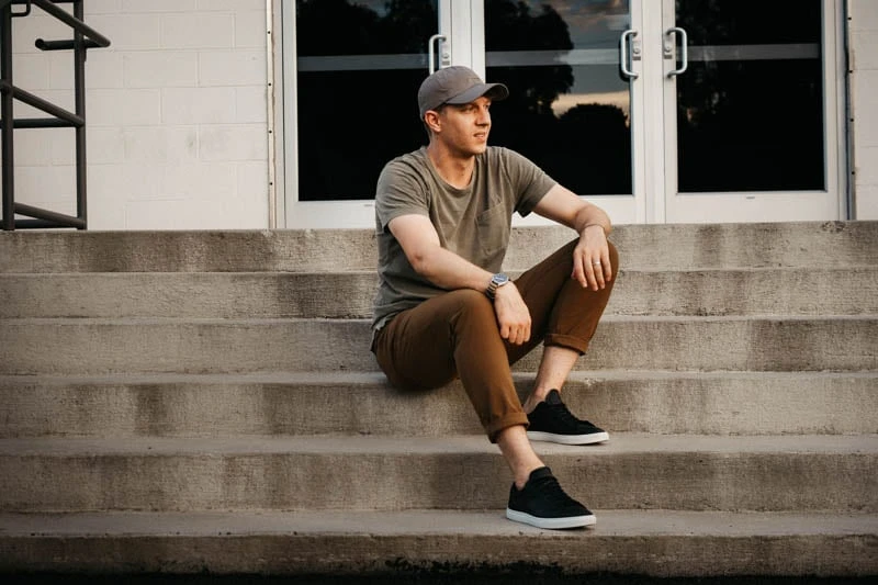 GREATS The Royale Review: My Thoughts After 2 Years of Wear 62 Model wearing olivers passage pant and oliver cabll low 1 minimalist sneakers