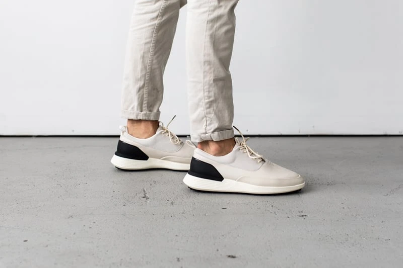 Wolf and Shepherd Crossover Golf from side profile with white chinos