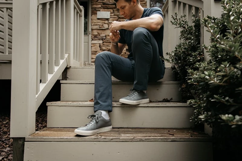 GREATS The Royale Review: My Thoughts After 2 Years of Wear 57 model sitting wearing Greats royale