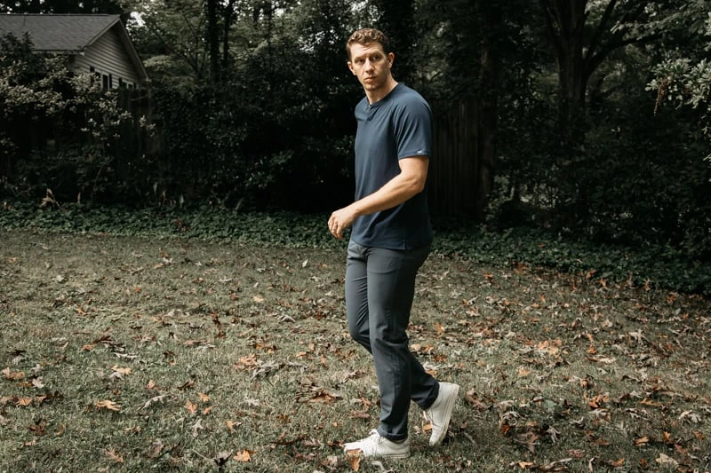 model wearing Western Rise Evolution Pant in grey blue