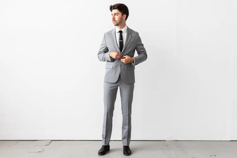 Bluffworks Presidio Blazer and Pants model buttoning jacket