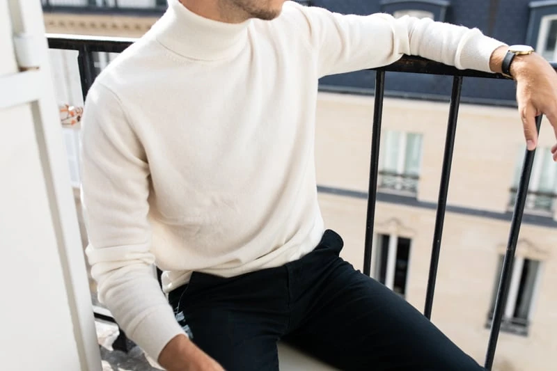 Gobi Cashmere Review: I Tried Their Most Popular Styles 52 Gobi Cashmere basic turtle neck sweater model sitting in chair