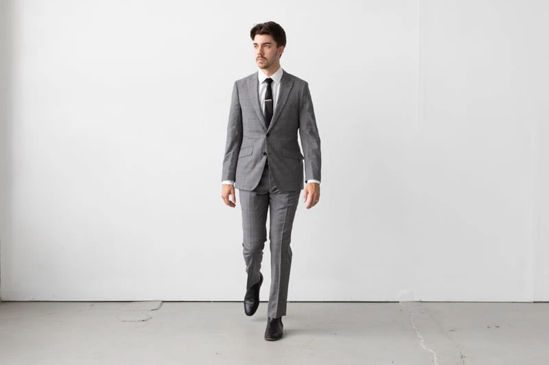 Indochino Harrogate Glen Check Suit being worn walking forward