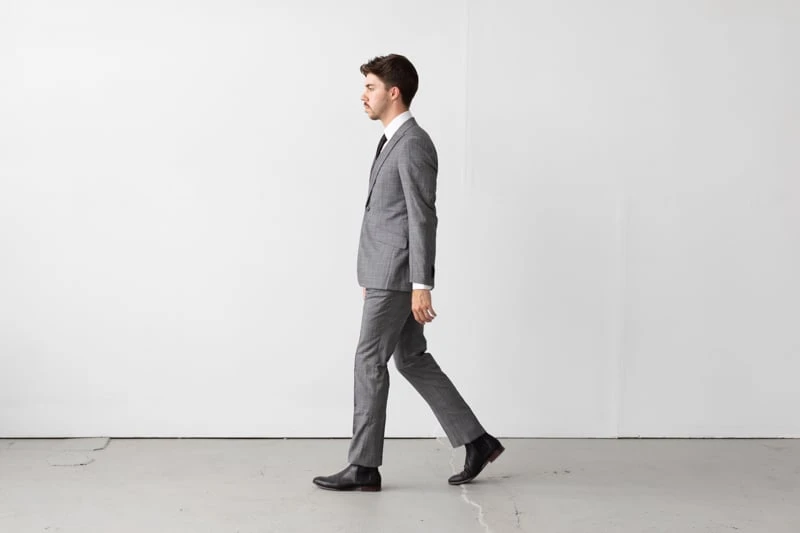 Indochino Harrogate Glen Check Suit being worn walking from side