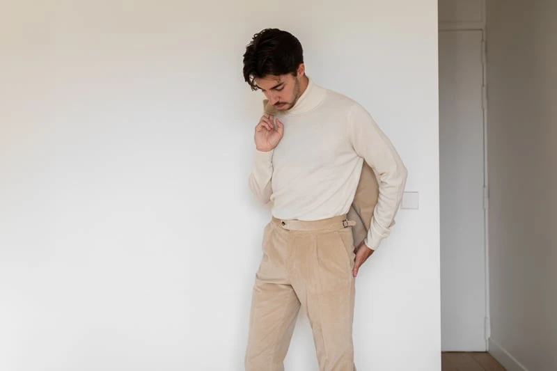 Suitsupply Custom Suit with turtleneck and jacket over shoulder