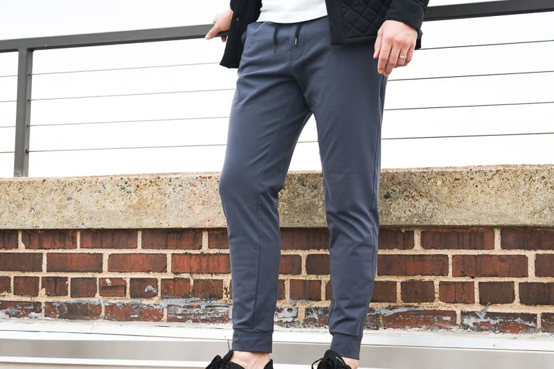 model with jacket and grey joggers