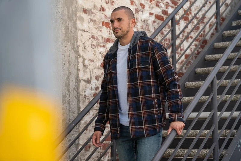 Model in Flag Anthem hooded flannel