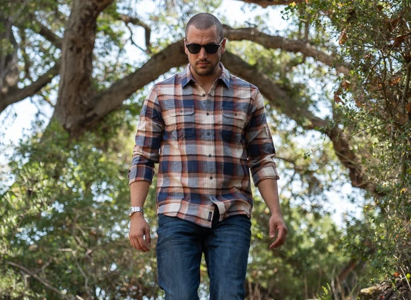 Model on trail in Flag Anthem apparel