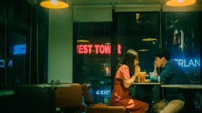 2022/12/The-Adult-Man-107-Date-Night-Ideas-That-Dont-Suck-from-a-Dating-Coach-Couple-in-Love-in-Diner.jpgw3.webp