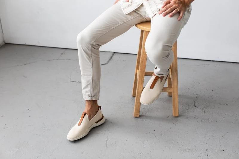 Wolf and Shepherd Swiftknit Loafers model sitting on stool